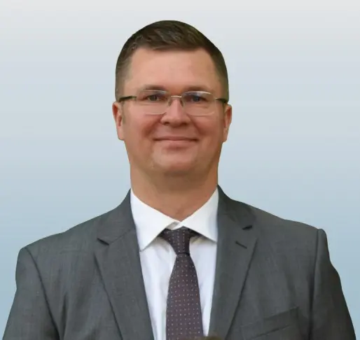 Portret dr inż. Roberta Lewickiego, rzecznika patentowego